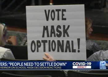 ‘Keep the politics out’ of school mask debates, Evers says