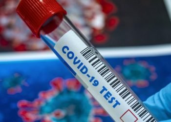 Health officials say vaccination is easier than long term weekly testing