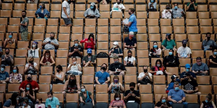 Canadian health officials warn of an ‘urgent need’ to vaccinate young adults.