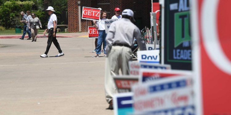 Voting bill becomes law, and an issue in future elections