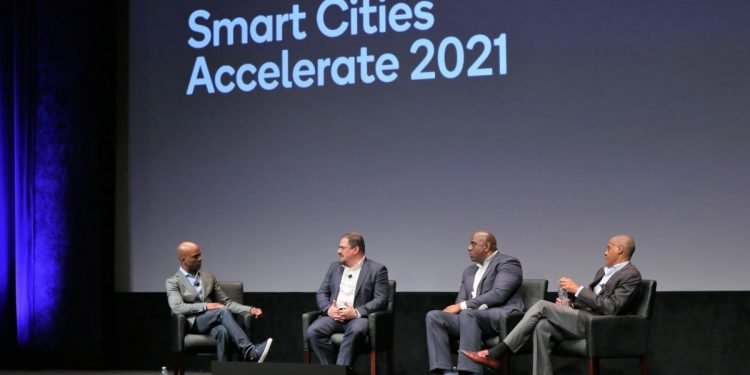 Magic Johnson sees smart tech as way to close societal gap