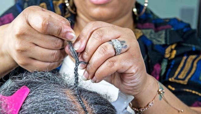 Her braids are rooted in family, culture