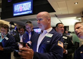 Futures edge up ahead of business activity data