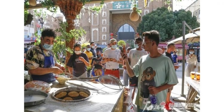 Visiting the Western Regions’ (Xiyu) Culture of a Millennium Ancient City