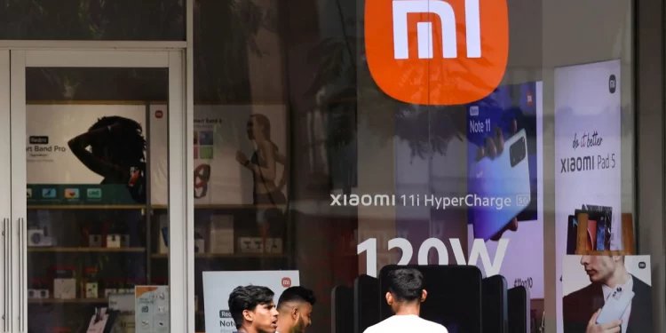 China’s Xiaomi says it will protect its business interests after India freezes its assets
